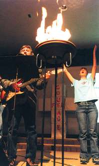 photo of singing 'Courage Under Fire' at diocesan high school rally