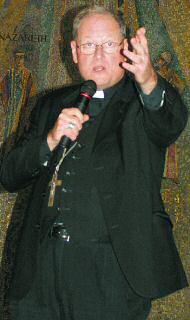 photo of Milwaukee Archbishop Timothy M. Dolan speaking in Madison