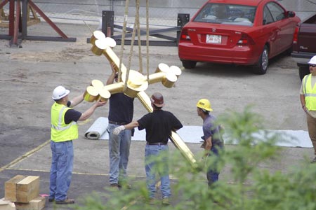 Cross taken down from steeple
