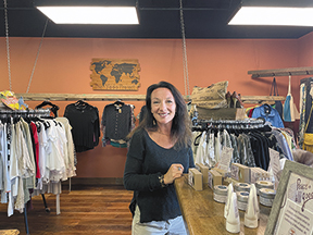 Beth Williams poses in store.