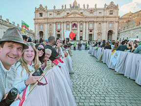 Colter Sikora, left, stands among the thousands in St. Peter’s Square waiting for the announcement of a new pope earlier this month. (Photo by Colter Sikora)