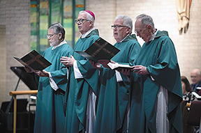 On August 10, Fr. Brian Wilk was installed as the pastor of Our Lady Queen of Peace Parish in Madison by Bishop Donald J. Hying of Madison. Pictured from left, are: Deacon Mark Zwolski, Bishop Hying, Father Wilk, and Fr. Jay Poster, parochial vicar. (Photo by Craig Schreiner)