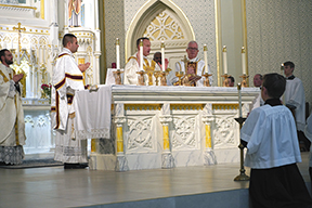 Bishop Donald J. Hying of Madison, far right, behind the altar, celebrates a special Mass for the Jubilee Year of Hope at St. Bernard Church in Watertown, part of St. Thérèse of Lisieux Parish, on September 10. Assisting at the Mass, were, from left: Parochial Vicar Fr. David Drefcinski, Deacon Mark Wagner, Pastor Fr. Tim Renz, and Parochial Vicar Fr. Milot Frederique, SMM, in the back. (Catholic Herald photo/James Debilzen)