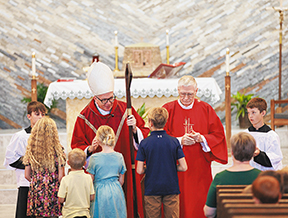 Students participate in the Mass celebrated by Bishop Donald J. Hying of Madison and assisted by Deacon William Bussan. (Contributed photo)